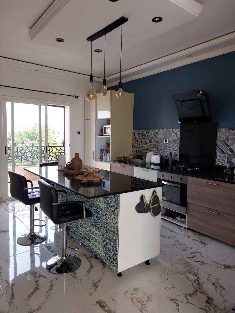 A  vendre villa avec commerces mostaganem 