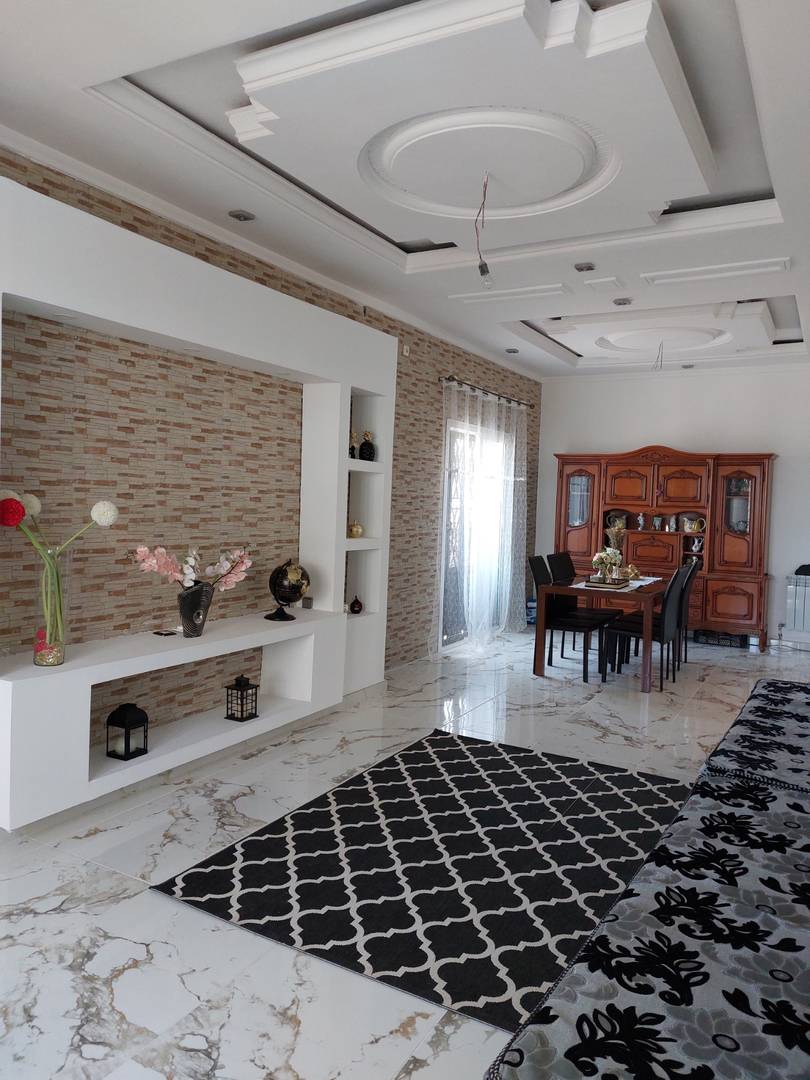 A  vendre villa avec commerces mostaganem 