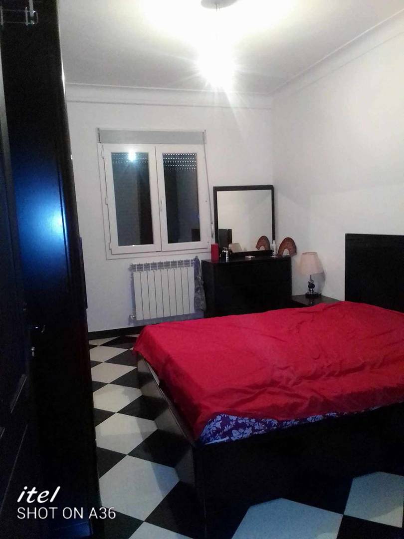 Vente d'un appartement de type F4 de 125 m2+ un local de 38 m2