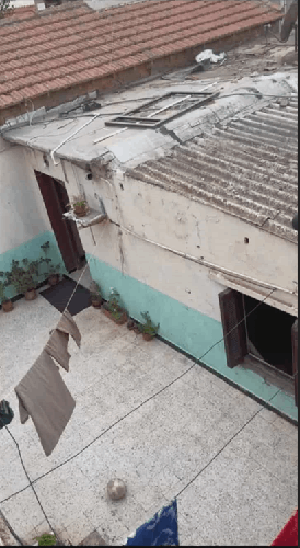 maison avec une cours RDC